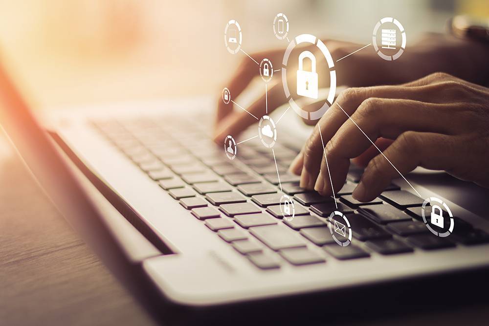 Cyber Security hands on keyboard