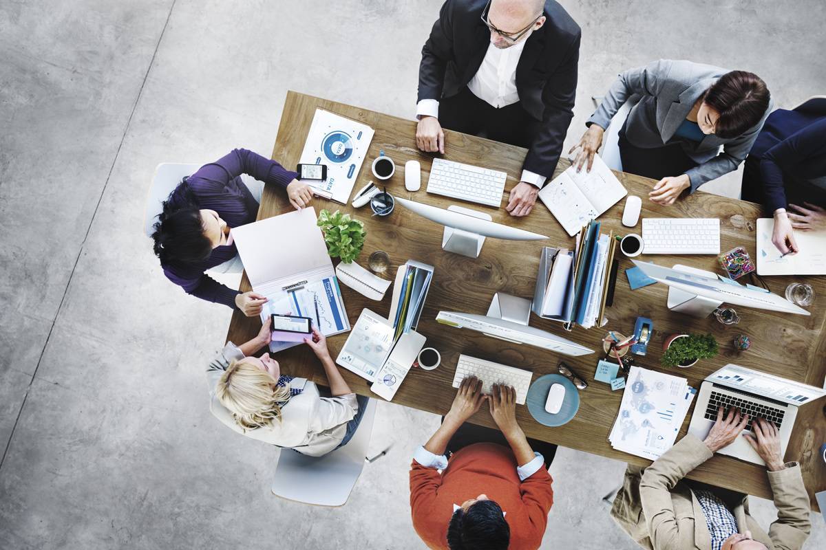 Business people meeting at a conference table.