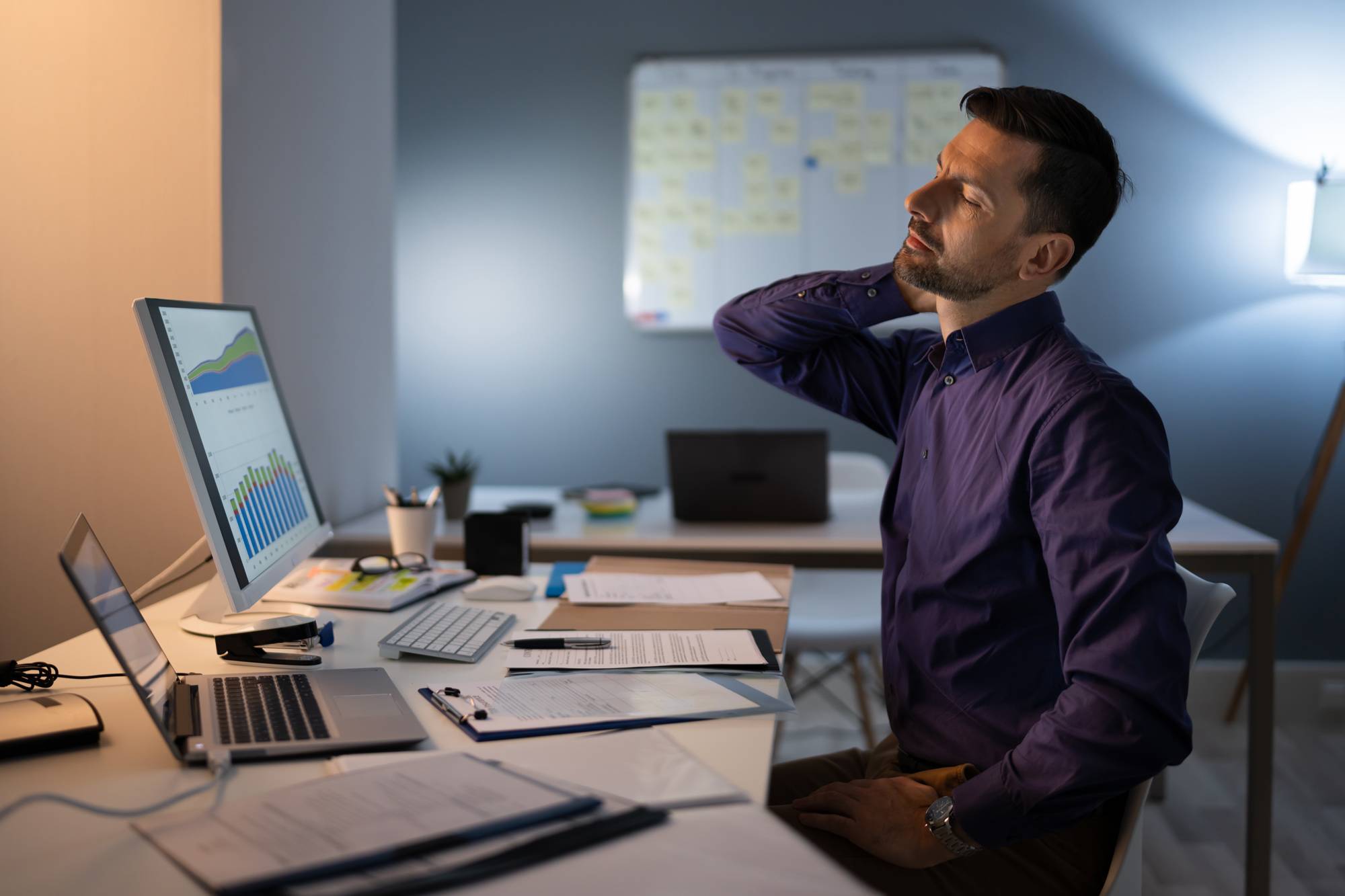 Photo Of Businessman Suffering From Neck Pain