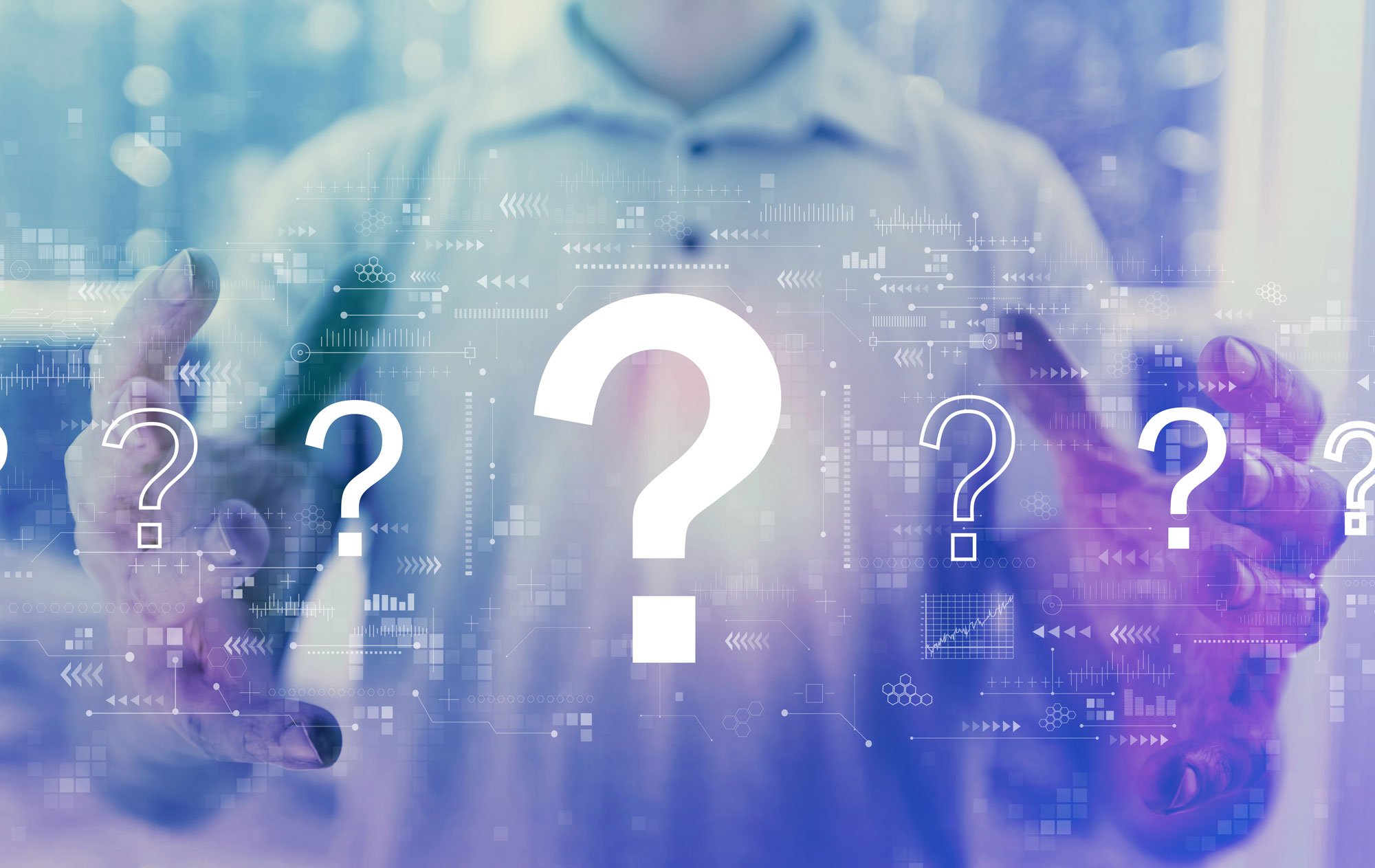 Question-marks-with-young-man-holding-his-hands Question marks with young man holding his hands