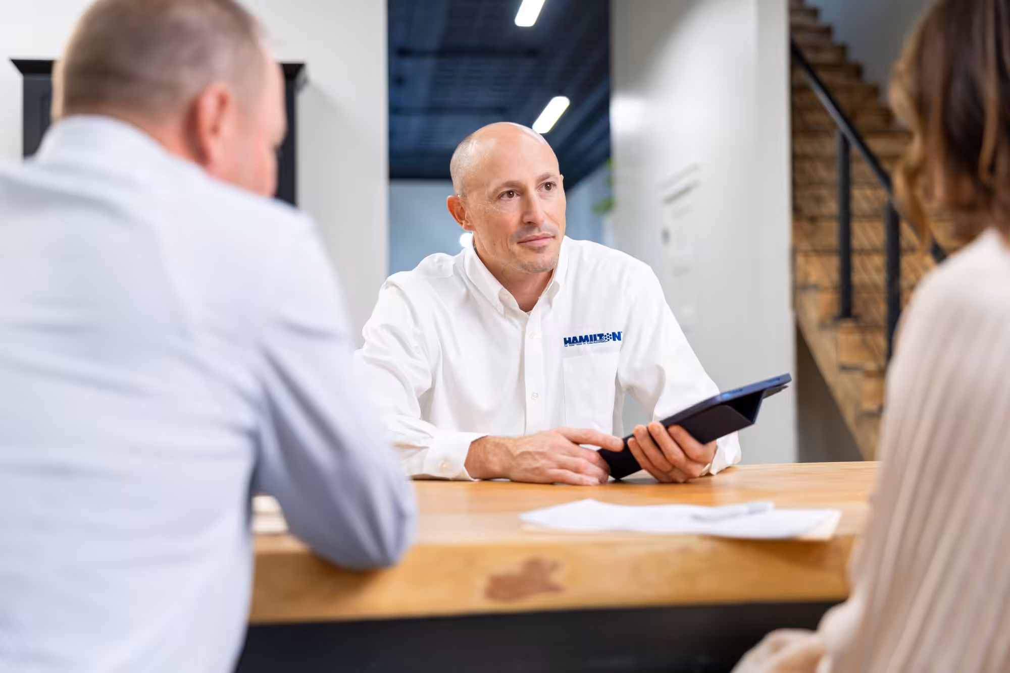 Hamilton Business Technologies Managed IT client meeting with sales person.