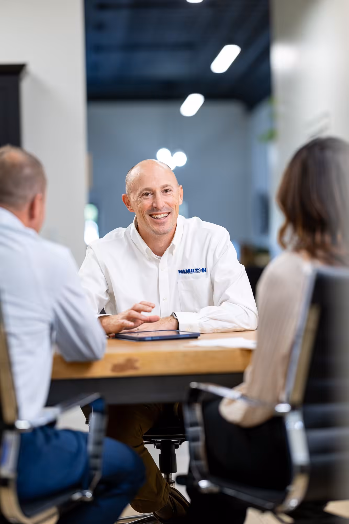 Hamilton new business manager meeting with IT services clients, Lincoln Hamilton new business manager meeting with IT services clients, Lincoln