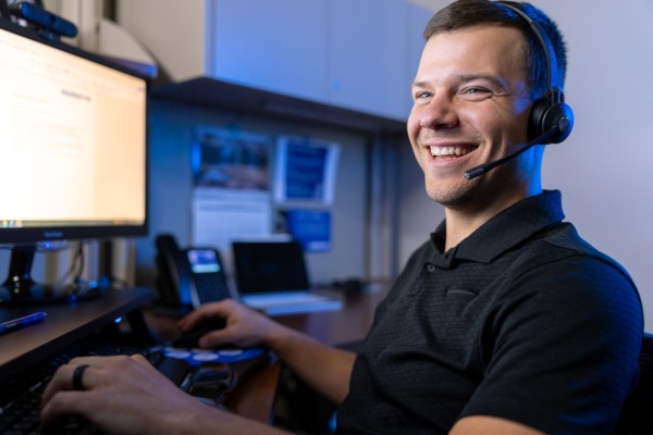 Hamilton Tech on the phone with a managed IT client.