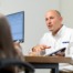 Hamilton sales rep meeting with a client showing potential IT consulting solutions
