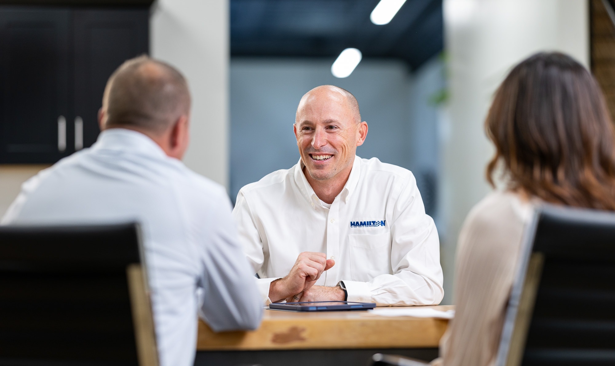 Hamilton Sales employee meeting with potential cybersecurity clients