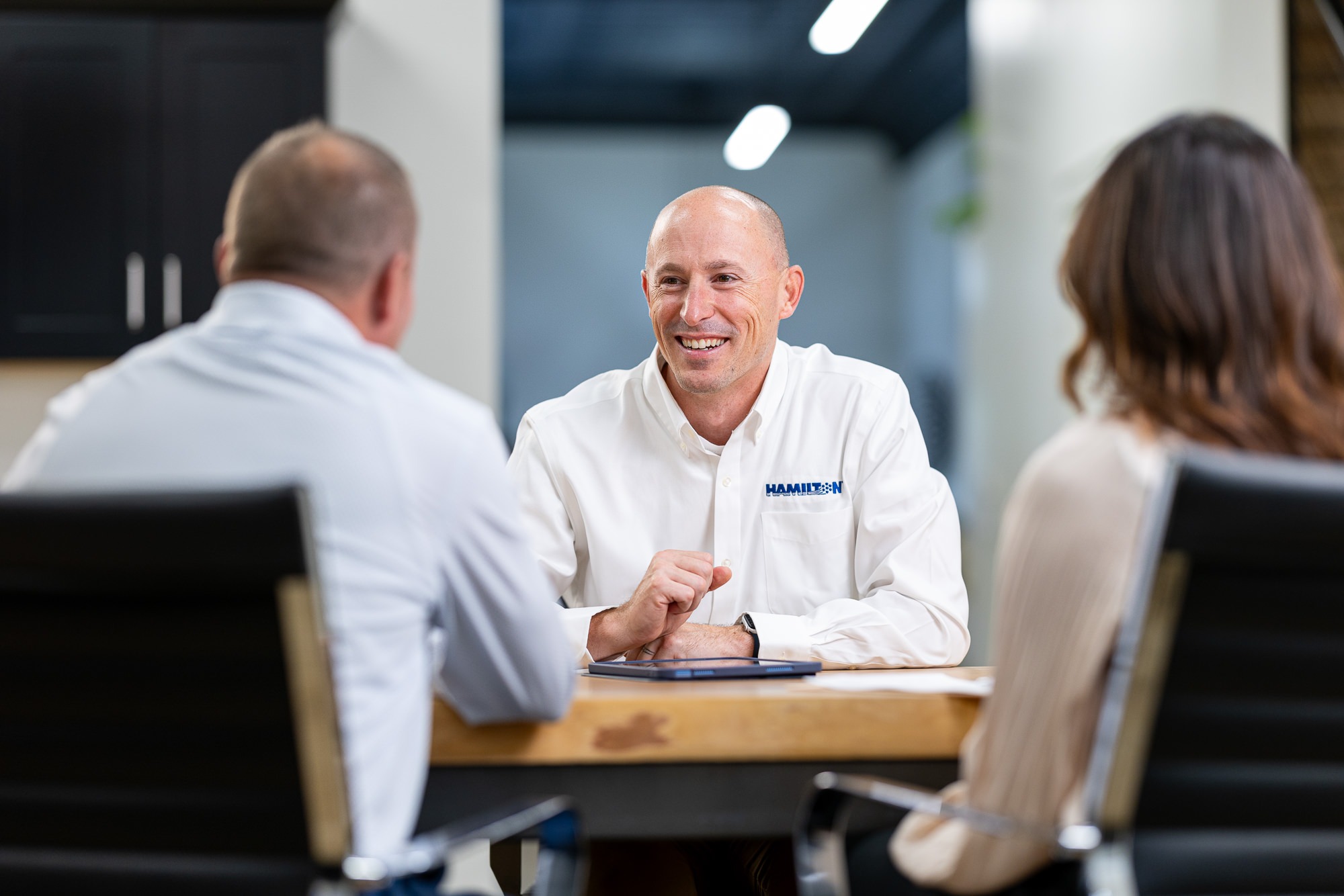Hamilton Sales employee meeting with potential cybersecurity clients Hamilton Sales employee meeting with potential cybersecurity clients