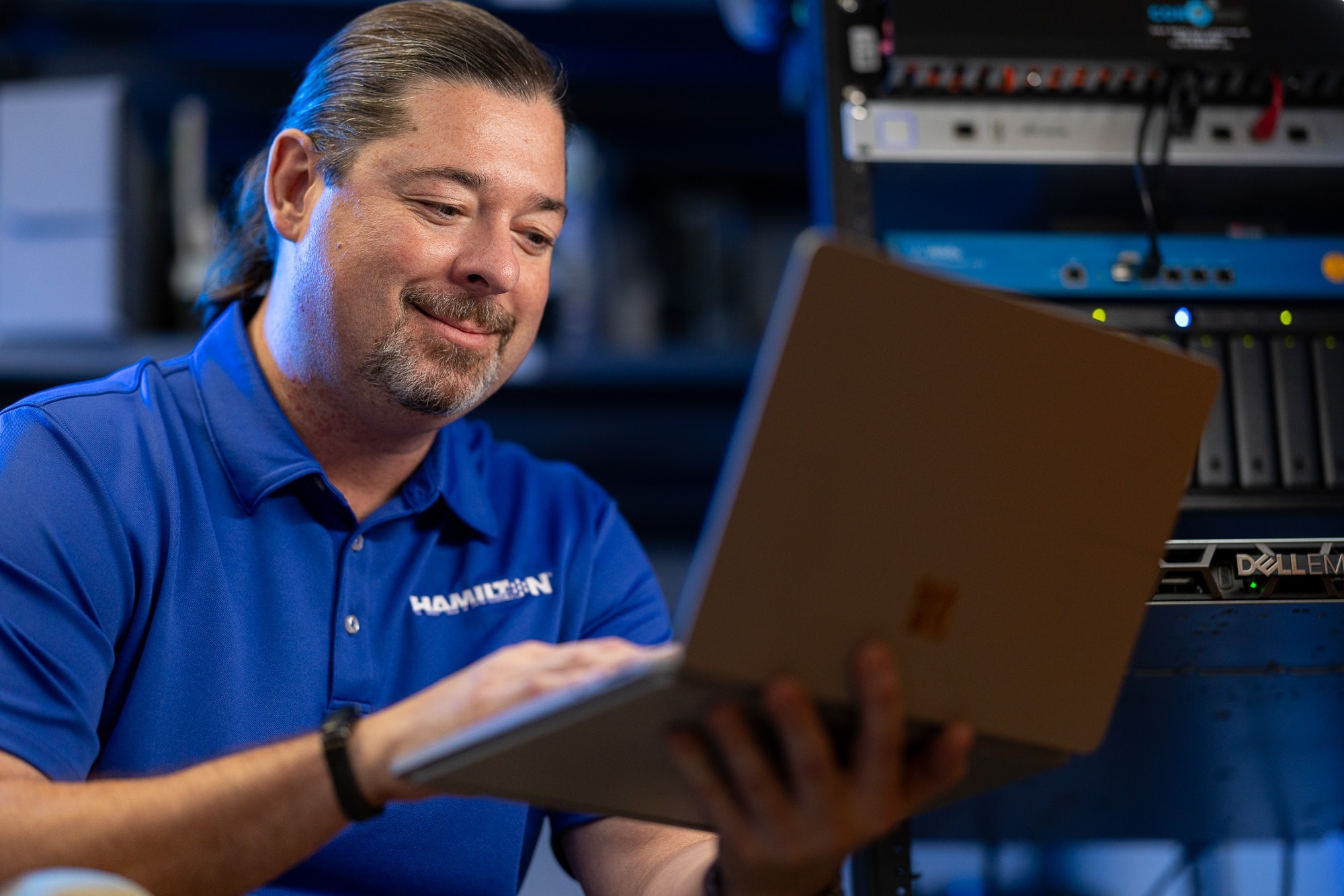 Hamilton Tech working on an vulnerability assessment in a server room