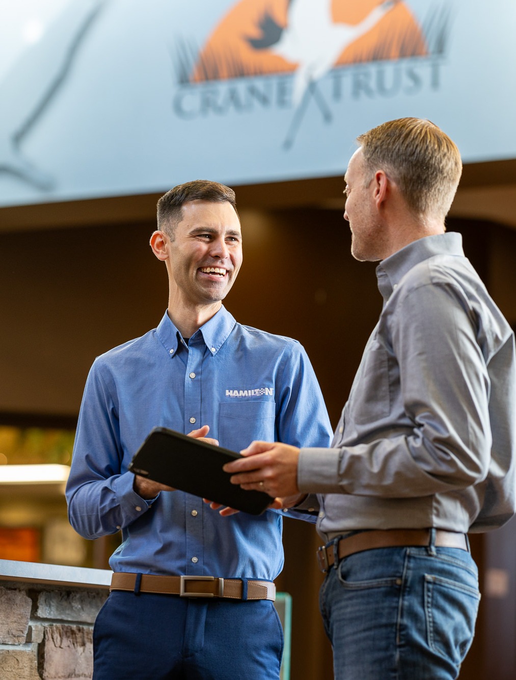 hamilton division manager meeting with a client