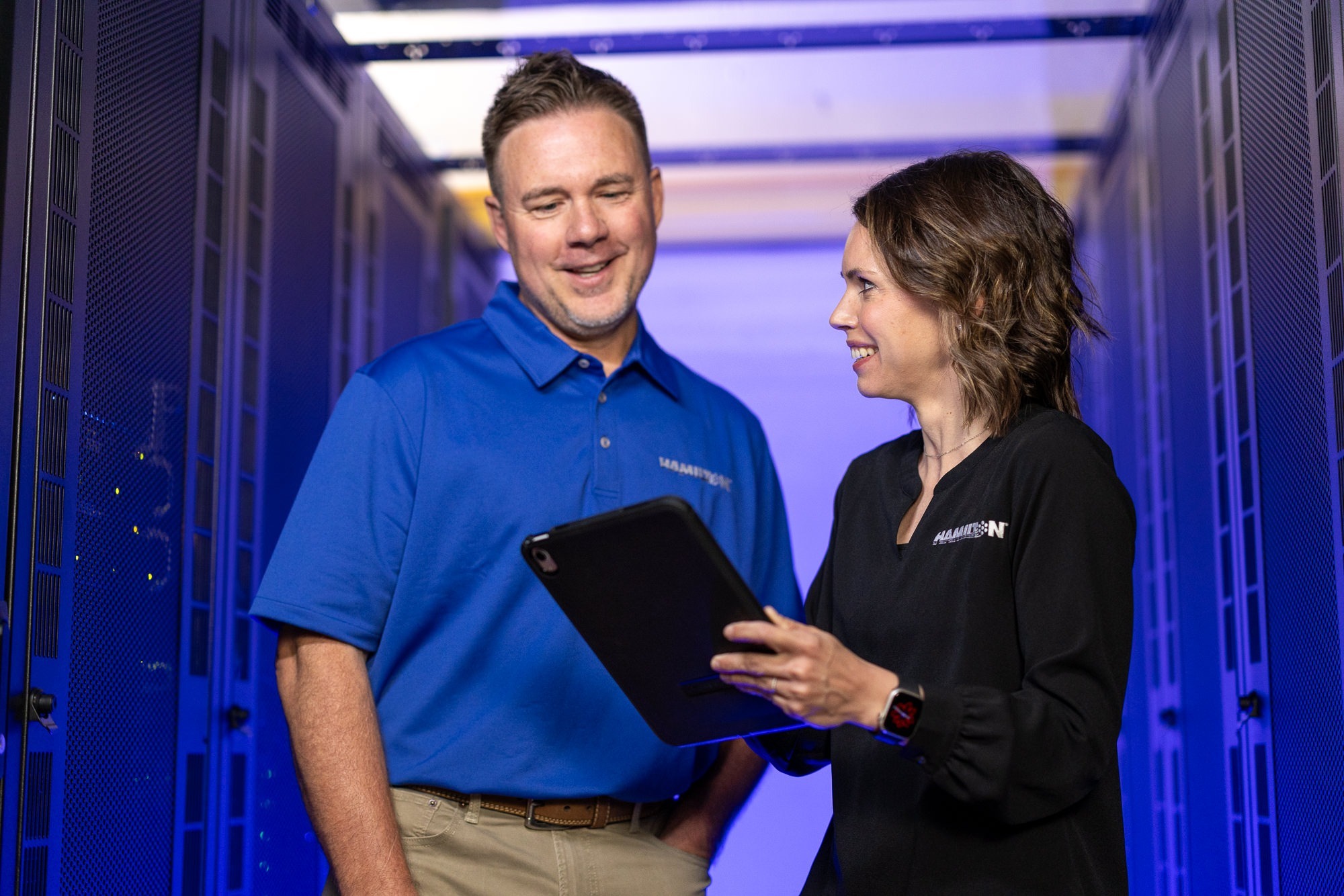Hamilton techs in data center securing a network