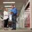 hamilton tech showing a school administrator Hamilton Education IT services in a school hallway