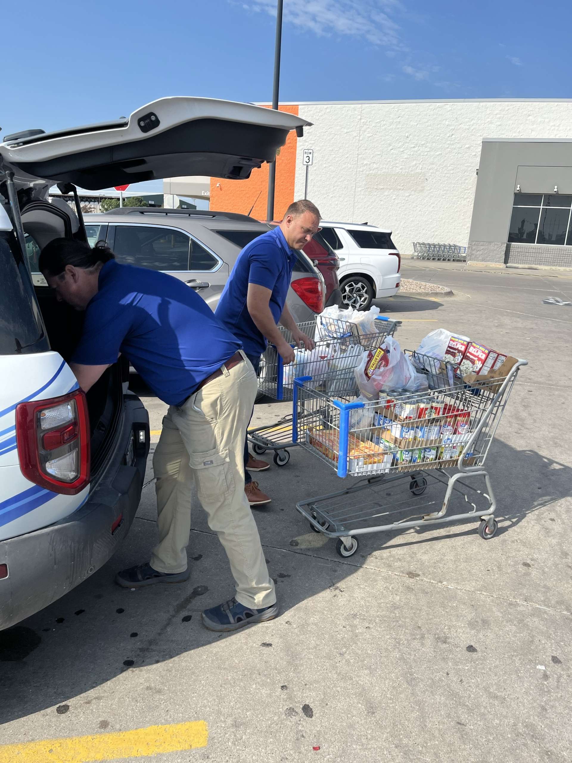 Hamilton tech serving with United Way Food Drive