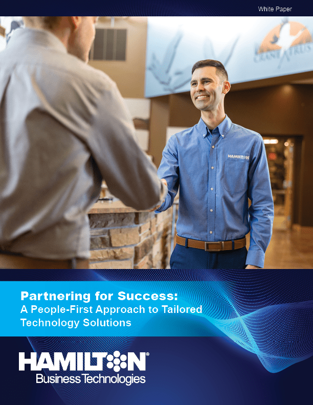 white paper cover images showing a hamilton employee shaking hands with a customer