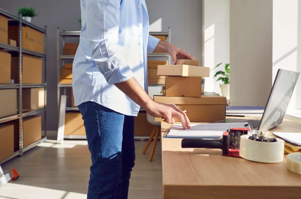 Midsection,Shot,Of,A,Man,Is,Working,At,A,Warehouse